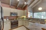 Updated Modern Kitchen with Stainless Steel Appliances